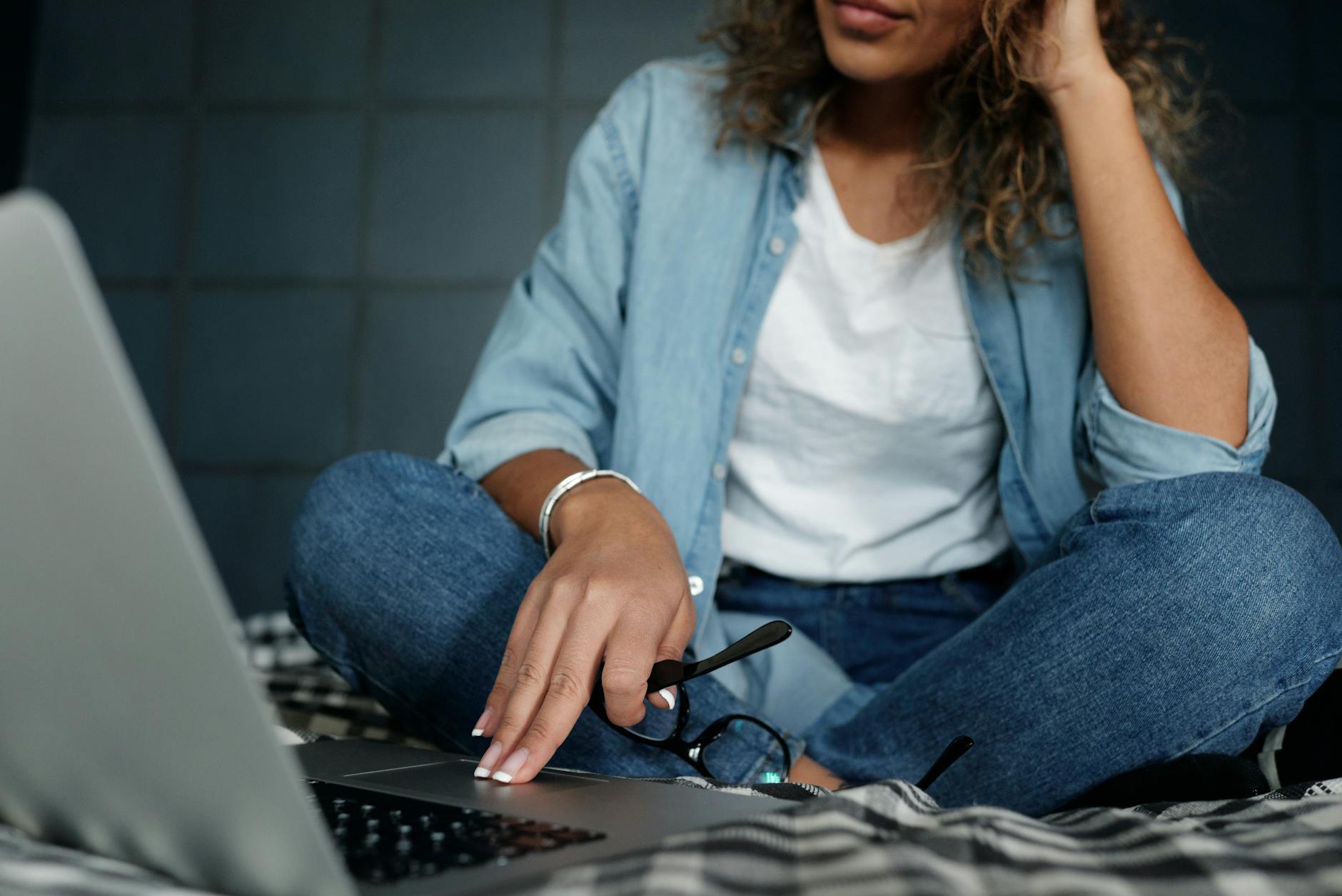 photo of woman wearing denim jeans